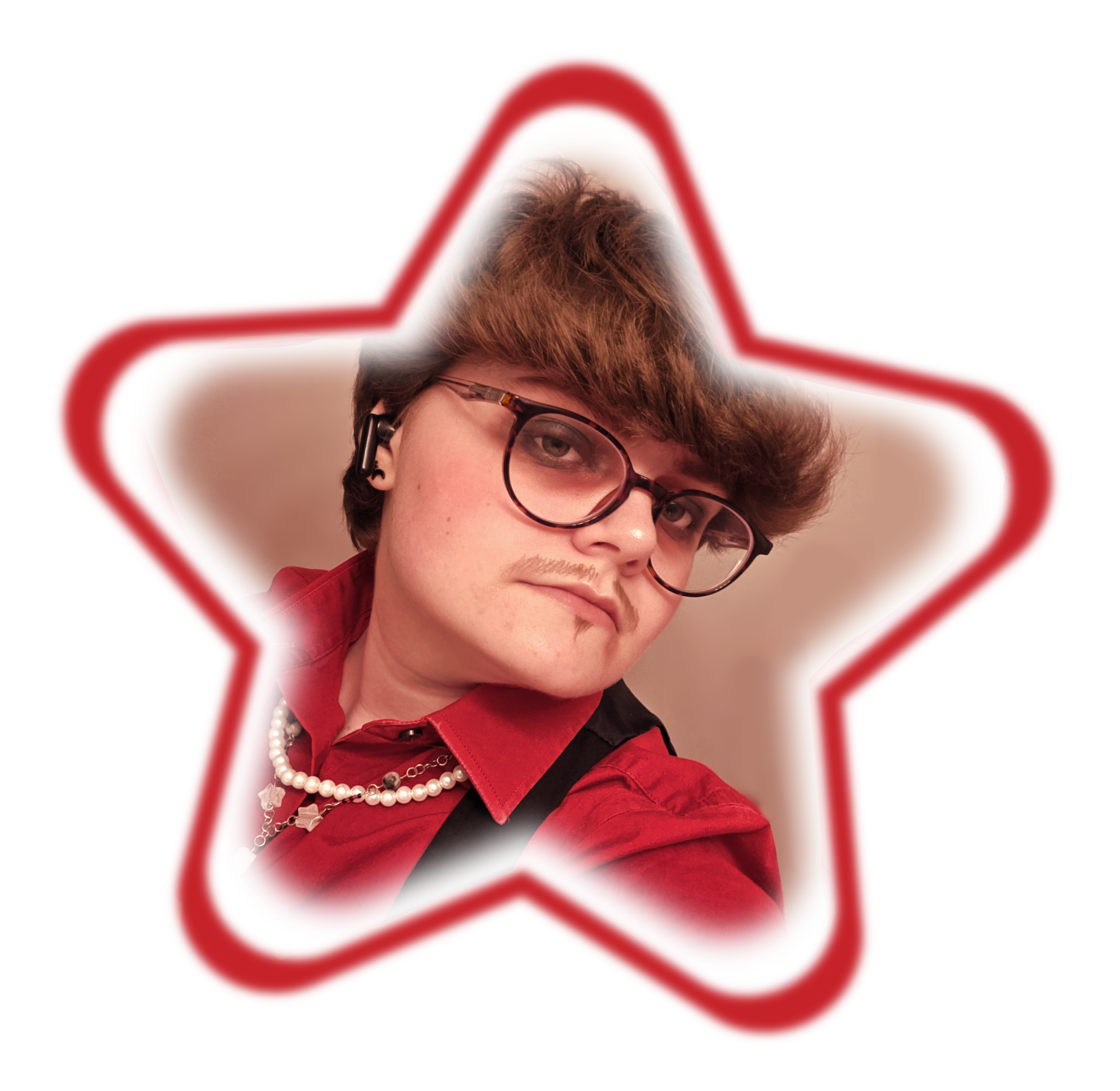 An image of the webmaster, Charlie, with a star border. He has short brown hair, glasses, and his wearing heavy red and black makeup.